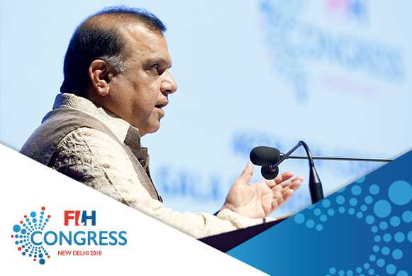 FIH President Dr Narinder Dhruv Batra addressing the guests at the FIH Honorary Awards ceremony in New Delhi. Credit: Hockey India