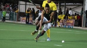 Alfred Ntiamoah tackles his opponent from behind during their match against South Africa