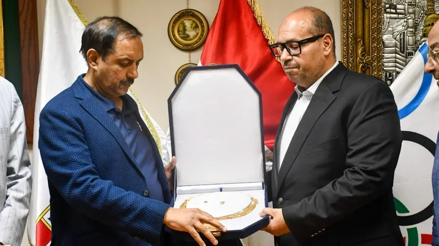 FIH President Tayyab Ikram decorated with the Collar of Honor by the Egyptian Olympic Committee