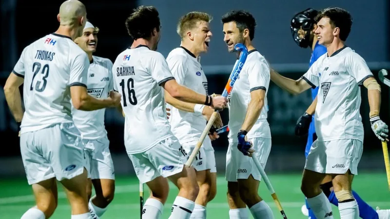 New Zealand tops Pool A
